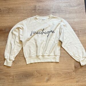 Cream Women's Sweater with Michigan Writing on Front